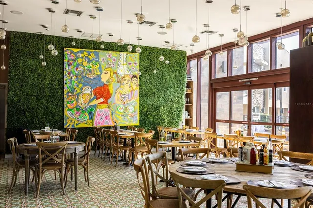 a view of a swimming pool and lounge chair