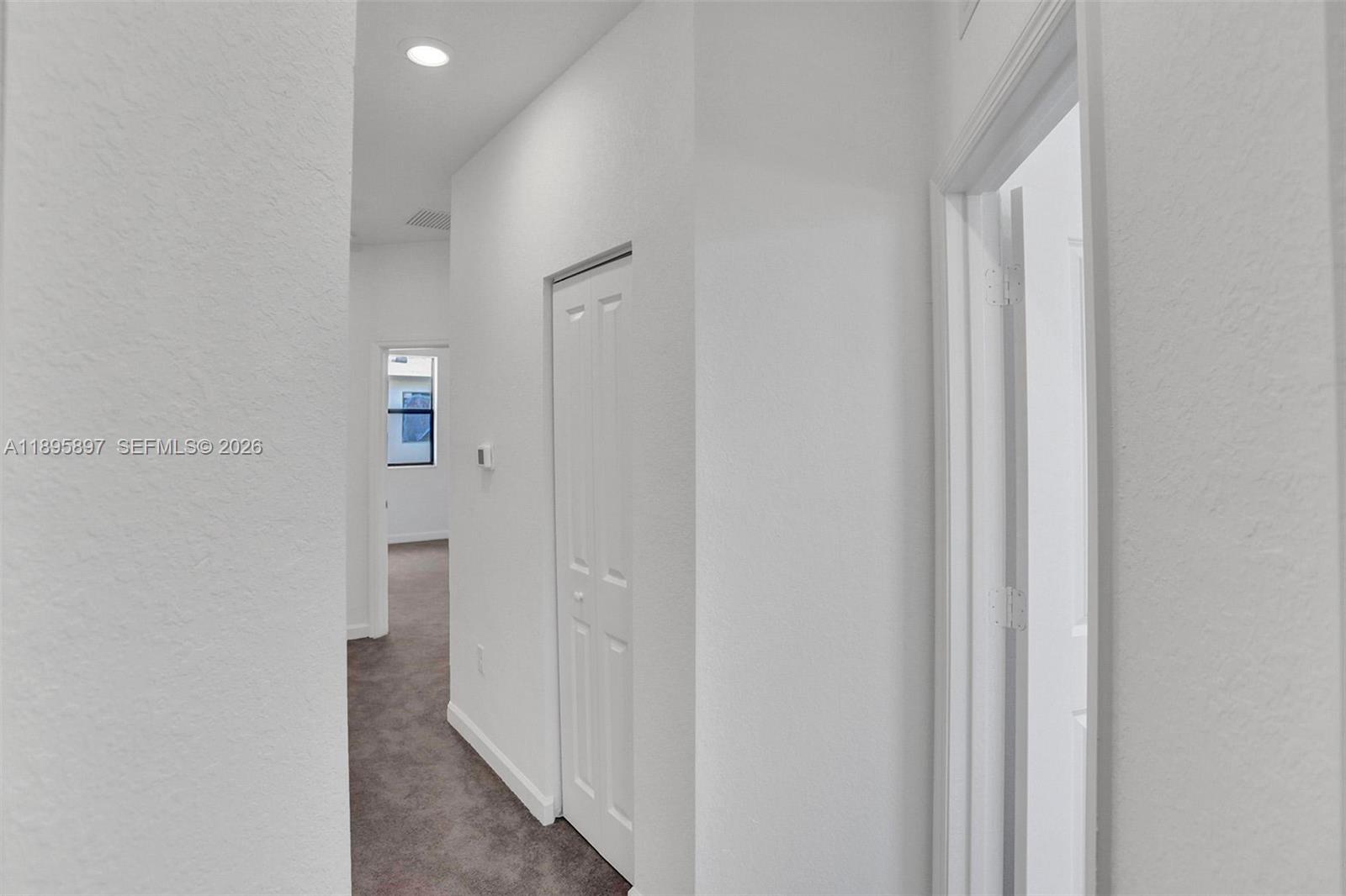 13375 Southwest 287th Street Homestead, FL 33033 - Photo 37 of 44 a view of a room with door