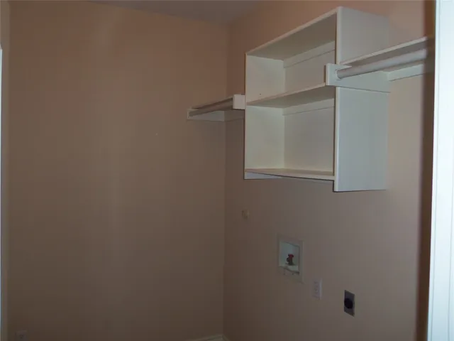 a bathroom with a toilet and a sink