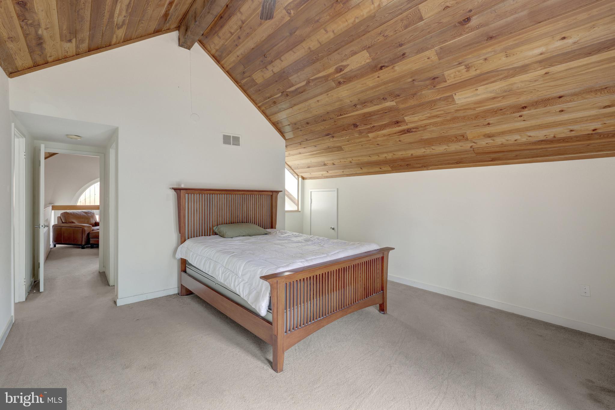 1941 Upper Lake Drive Reston, VA 20191 - Photo 40 of 51 a bed sitting in a bedroom next to a window