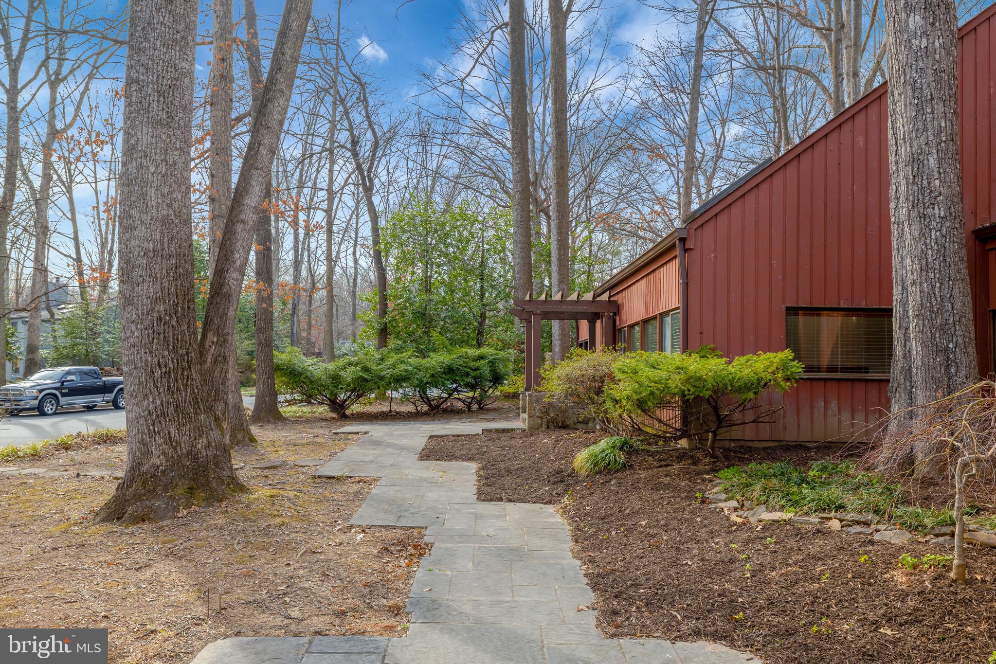 1941 Upper Lake Drive Reston, VA 20191 - Photo 44 of 51 a backyard of a house with yard and outdoor seating