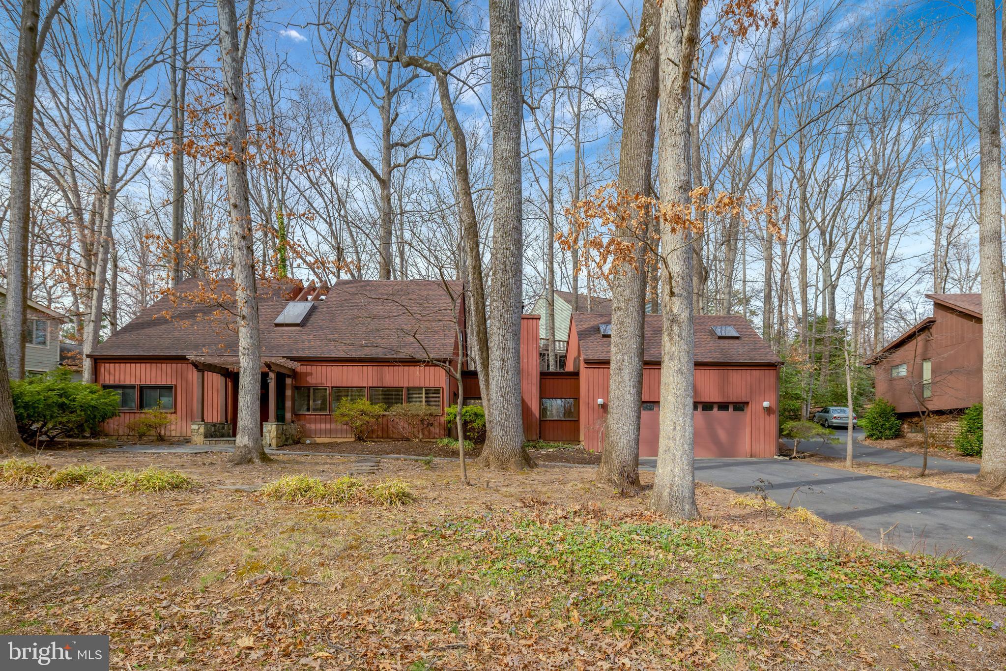 1941 Upper Lake Drive Reston, VA 20191 - Photo 46 of 51 front view of a house with a yard