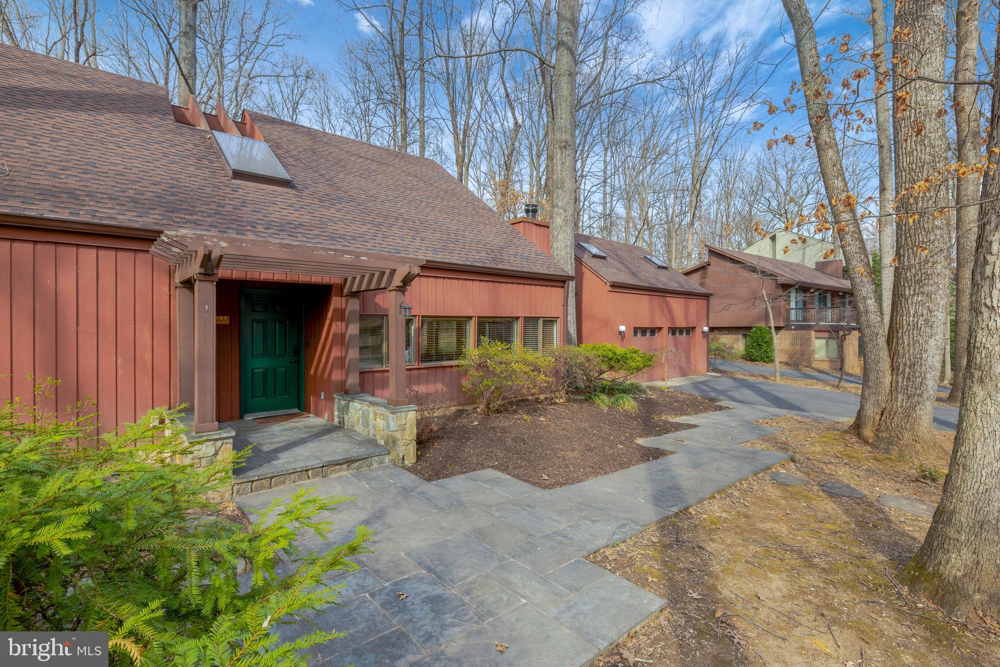 1941 Upper Lake Drive Reston, VA 20191 - Photo 47 of 51 a front view of a house with garden