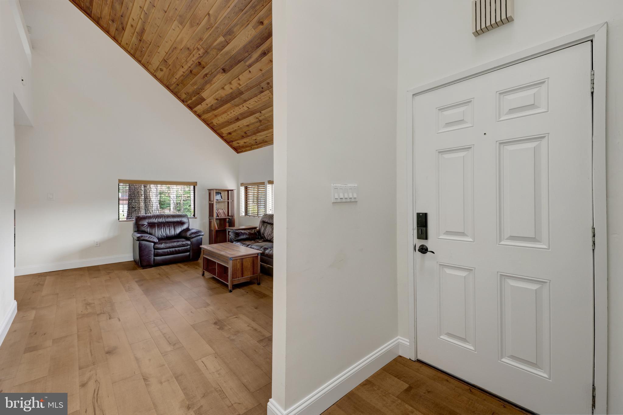 1941 Upper Lake Drive Reston, VA 20191 - Photo 6 of 51 a view of room with furniture and wooden floor