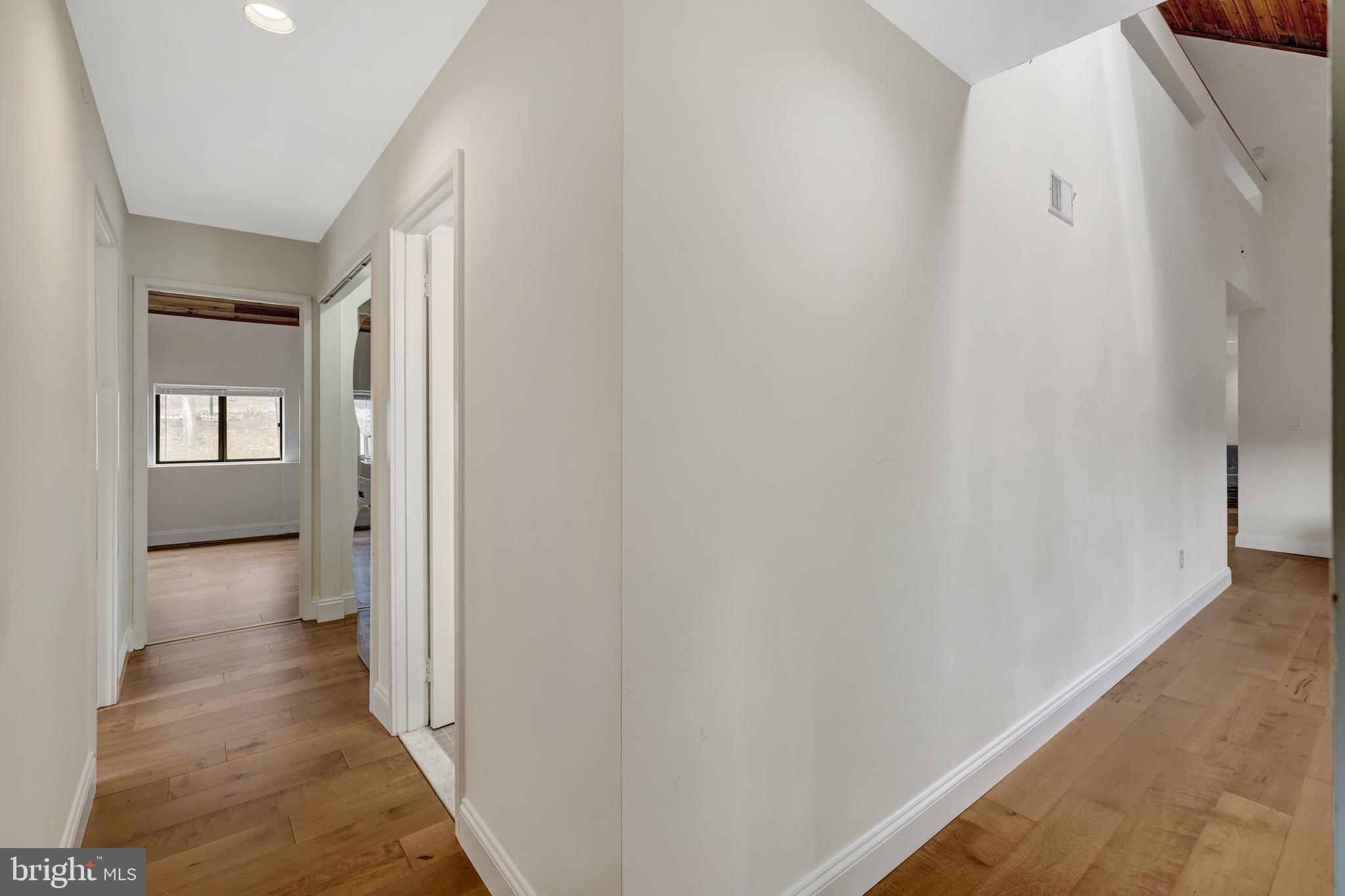 1941 Upper Lake Drive Reston, VA 20191 - Photo 9 of 51 a view of a hallway with wooden floor