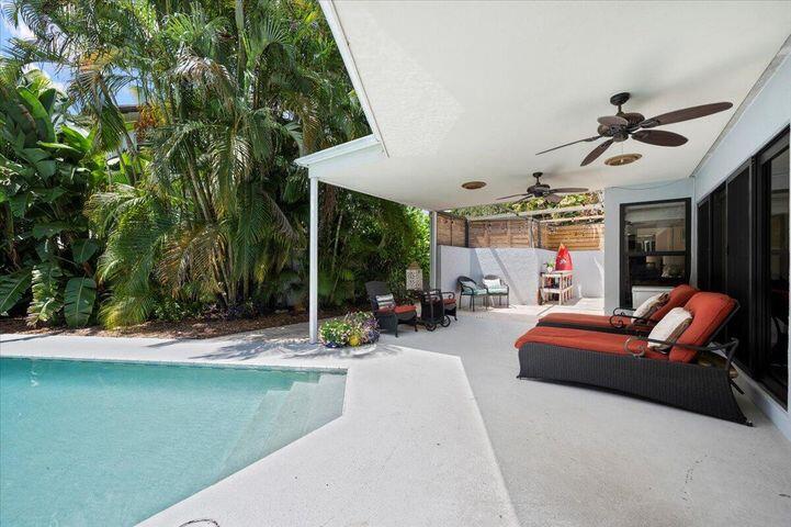 709 Irwin Lane Jupiter, FL 33458 - Photo 29 of 37 PATIO LOUNGE AREA