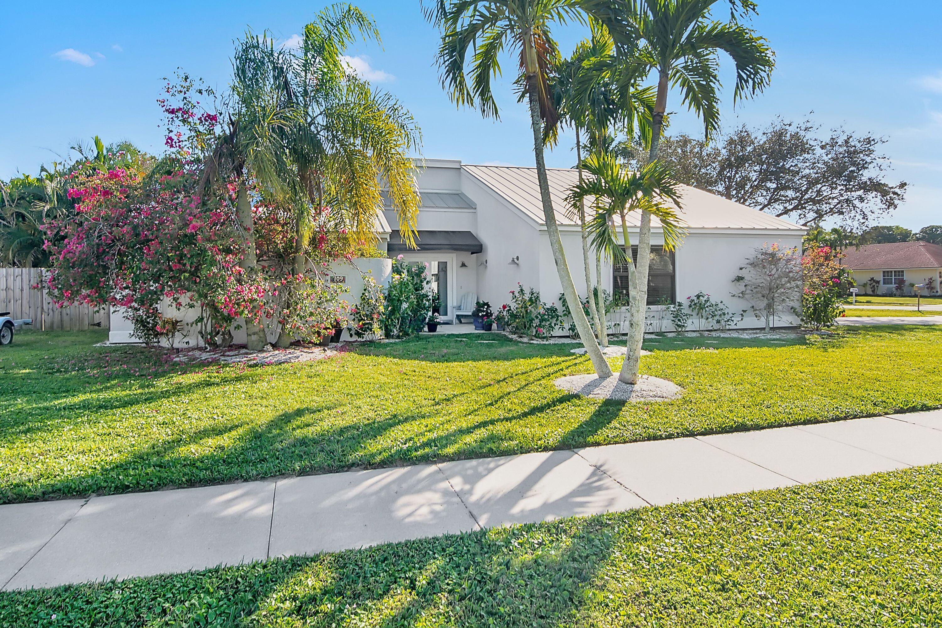 709 Irwin Lane Jupiter, FL 33458 - Photo 10 of 37 front yard