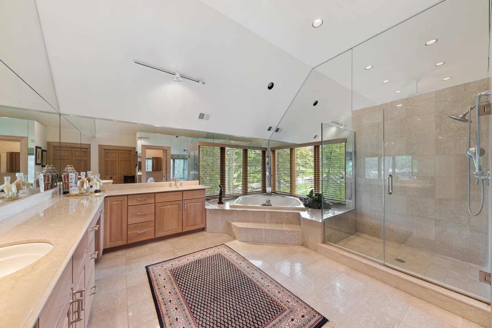 9 South Wynstone Drive North Barrington, IL 60010 - Photo 16 of 31 a large white bathroom with a large tub sink shower and mirror