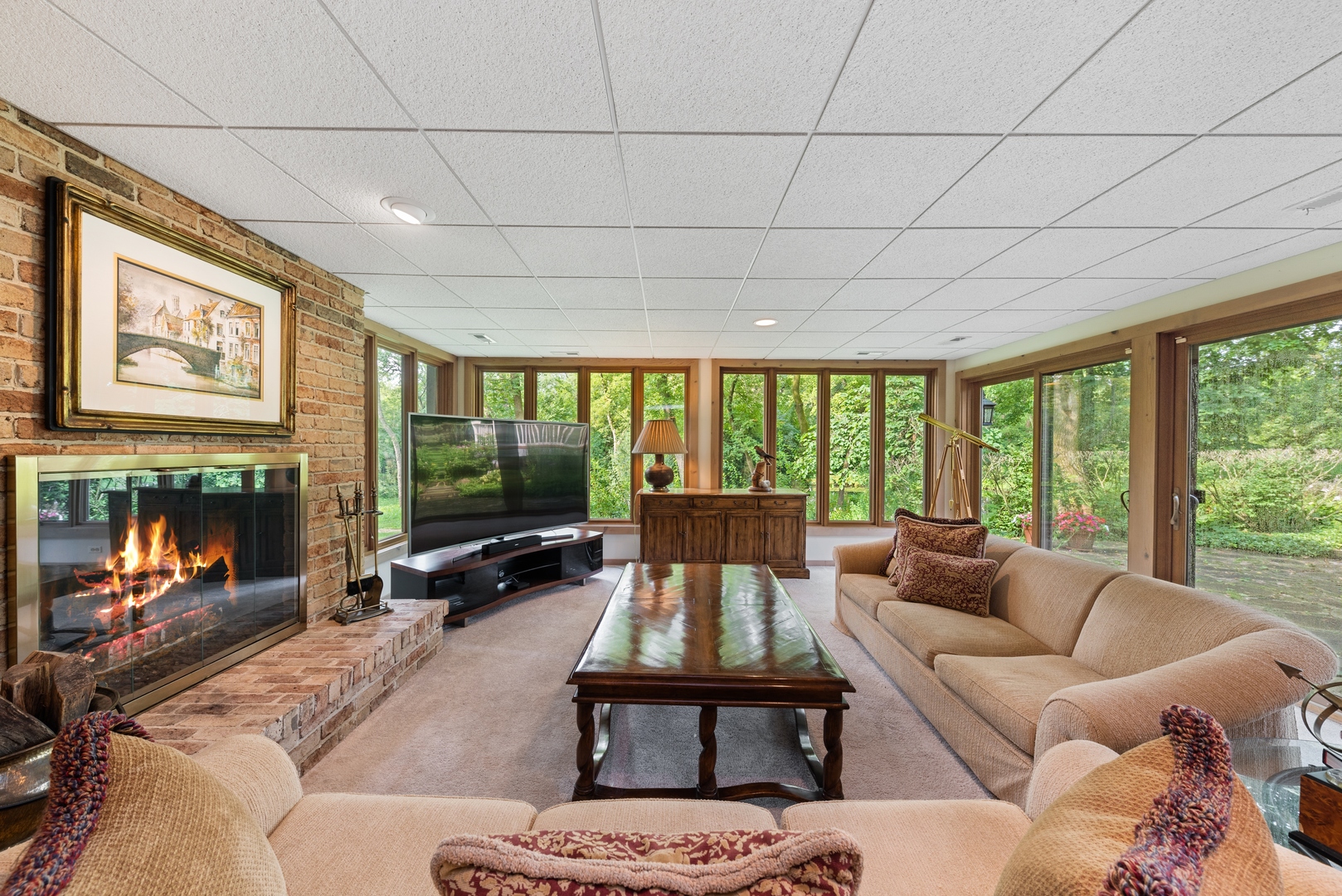 9 South Wynstone Drive North Barrington, IL 60010 - Photo 24 of 31 a living room with furniture a flat screen tv and a large window
