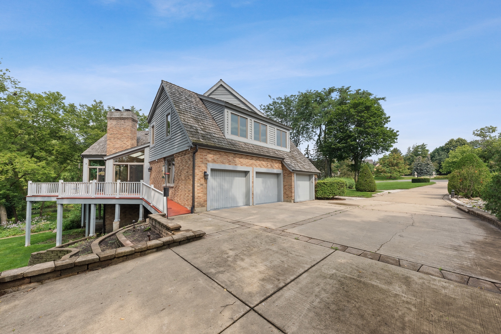 9 South Wynstone Drive North Barrington, IL 60010 - Photo 29 of 31 a front view of a house with a yard and garage