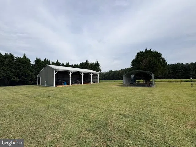 a house view with a garden space
