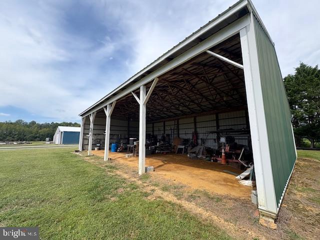 21682 Dover Bridge Road Preston, MD 21655 - Photo 6 of 23 a view of a house with backyard and porch