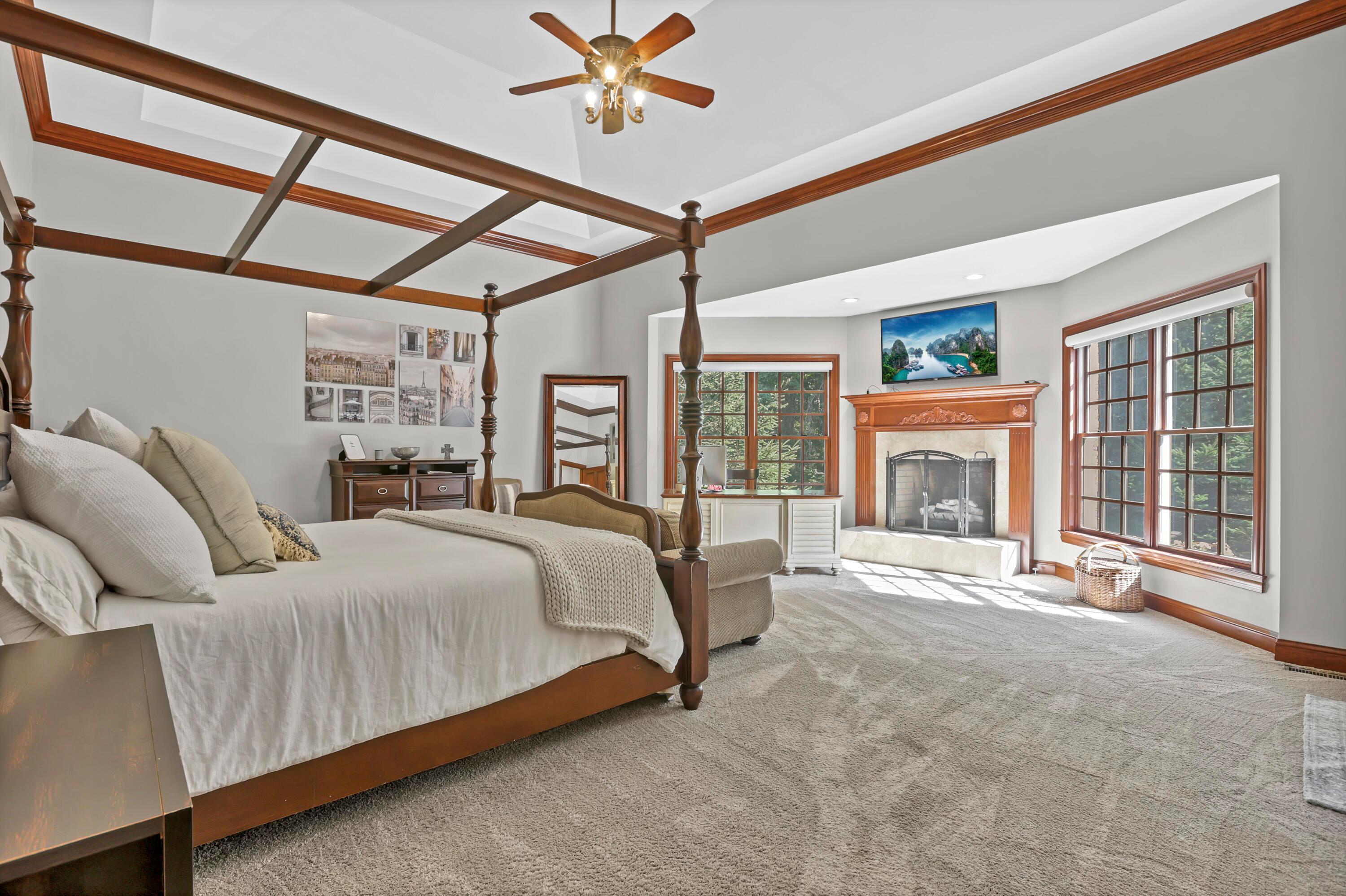 3575 State Rte 37 West Delaware, OH 43015 - Photo 54 of 106 Spacious room featuring a tray ceiling with wood trim, a ceiling fan, and carpeted flooring
