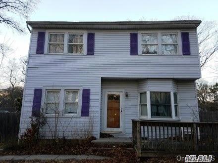 173 Aspen Road Mastic Beach, NY 11951 - Photo 1 of 1 a front view of a house
