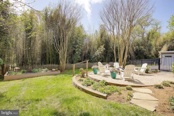 a swimming pool with wooden fence