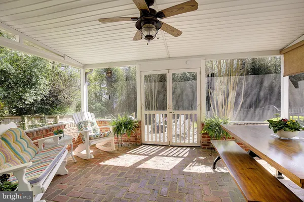 a view of a livingroom with furniture and windows