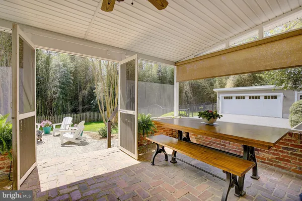 a living room with furniture or couch and a fireplace