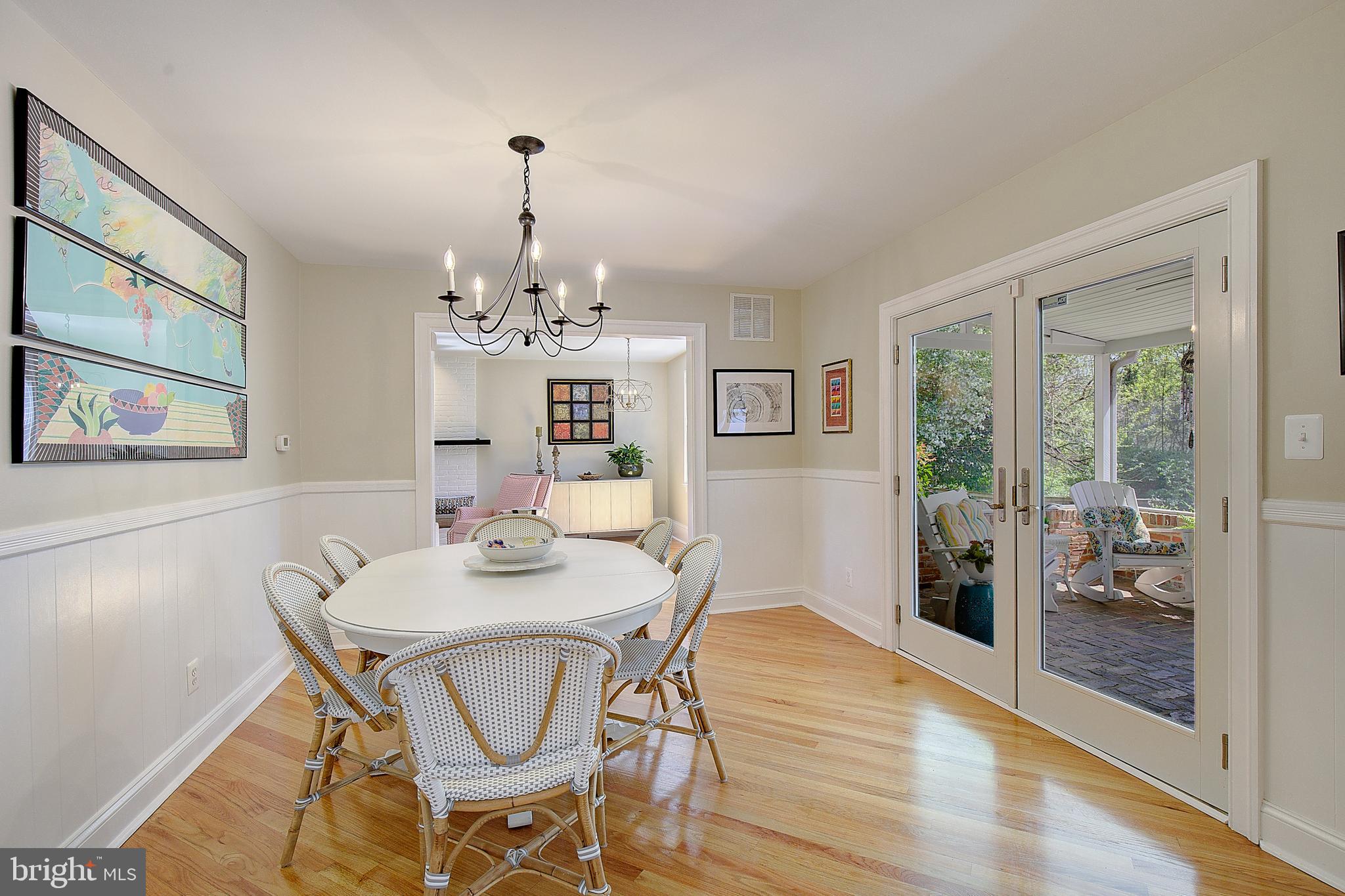 2 Isaacs Street Annapolis, MD 21401 - Photo 32 of 63 a dining room with chandelier and wooden floor
