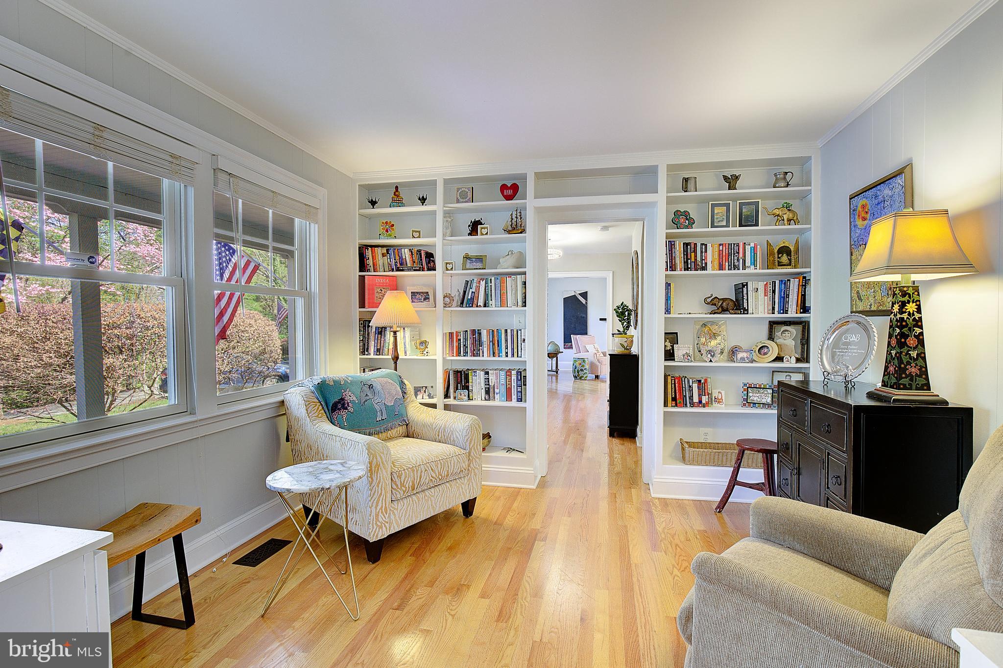 2 Isaacs Street Annapolis, MD 21401 - Photo 45 of 63 a living room with furniture a bookshelf and a window