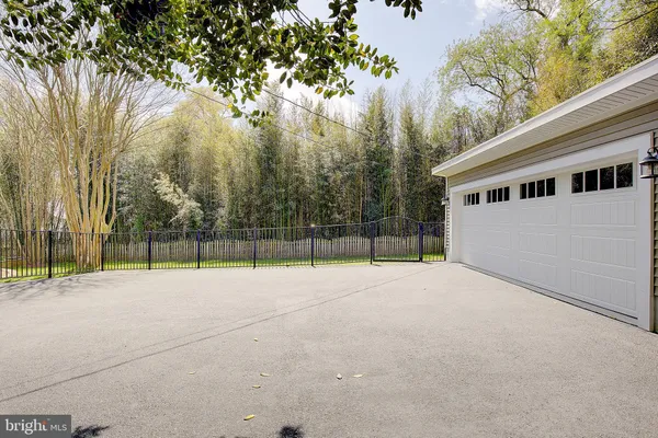 a building outdoor space with patio furniture and potted plants