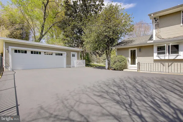 a outdoor space with the couches and dining table chair