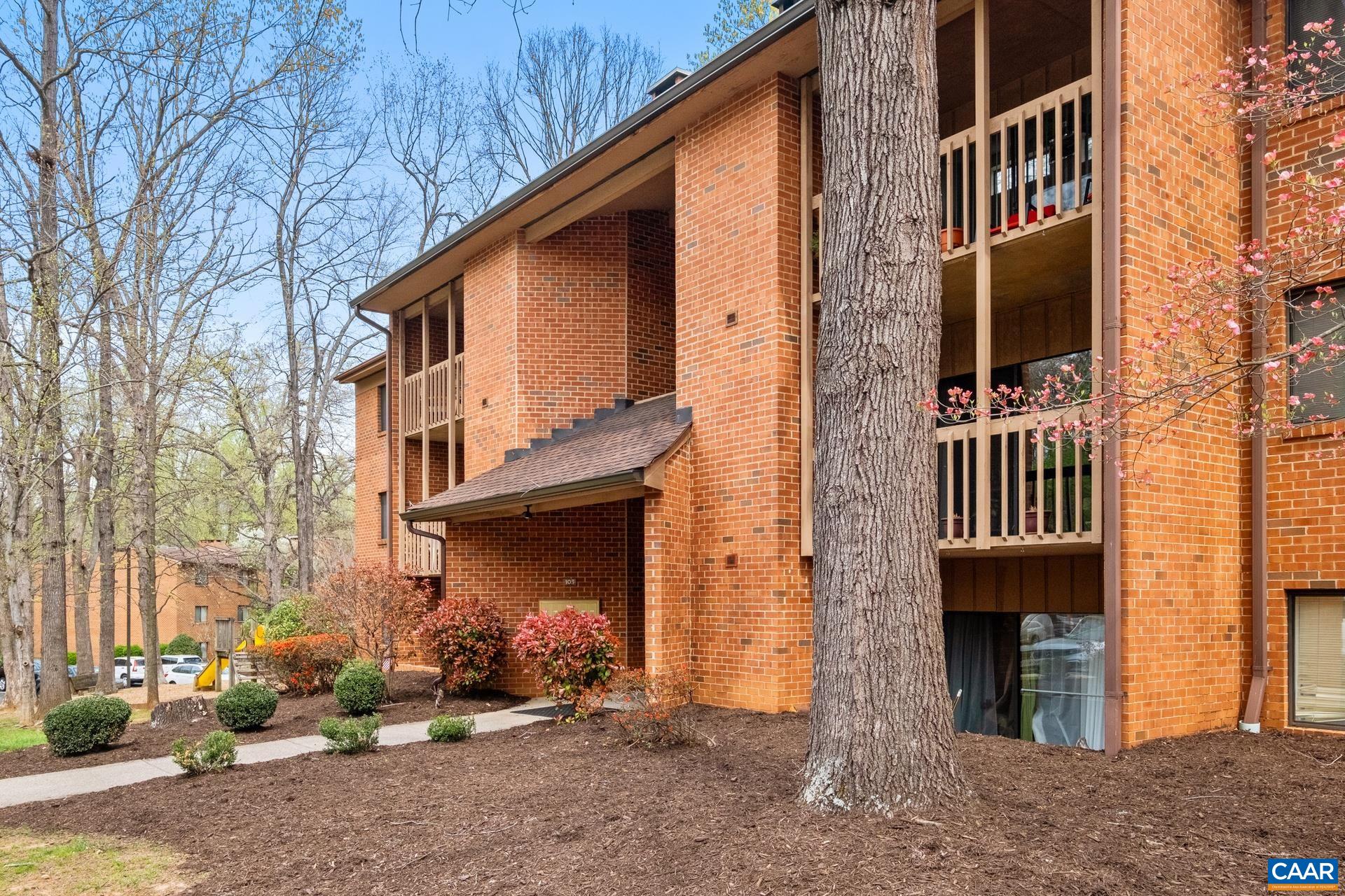 103 Turtle Creek Road, Unit 2 Charlottesville, VA 22901 - Photo 1 of 24 front view of a house with a yard