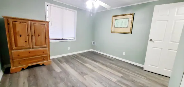 wooden floor and windows in a room
