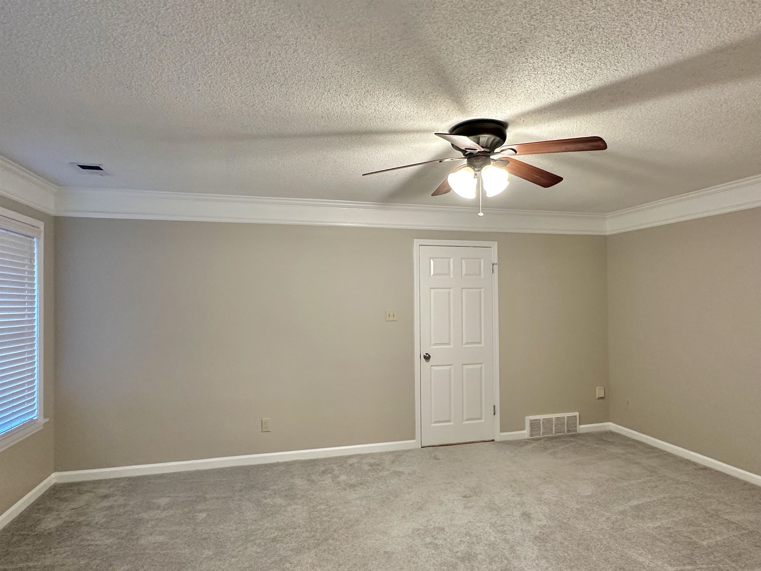 7475 Kingsland Drive Memphis, TN 38125 - Photo 11 of 32 a window in an empty room
