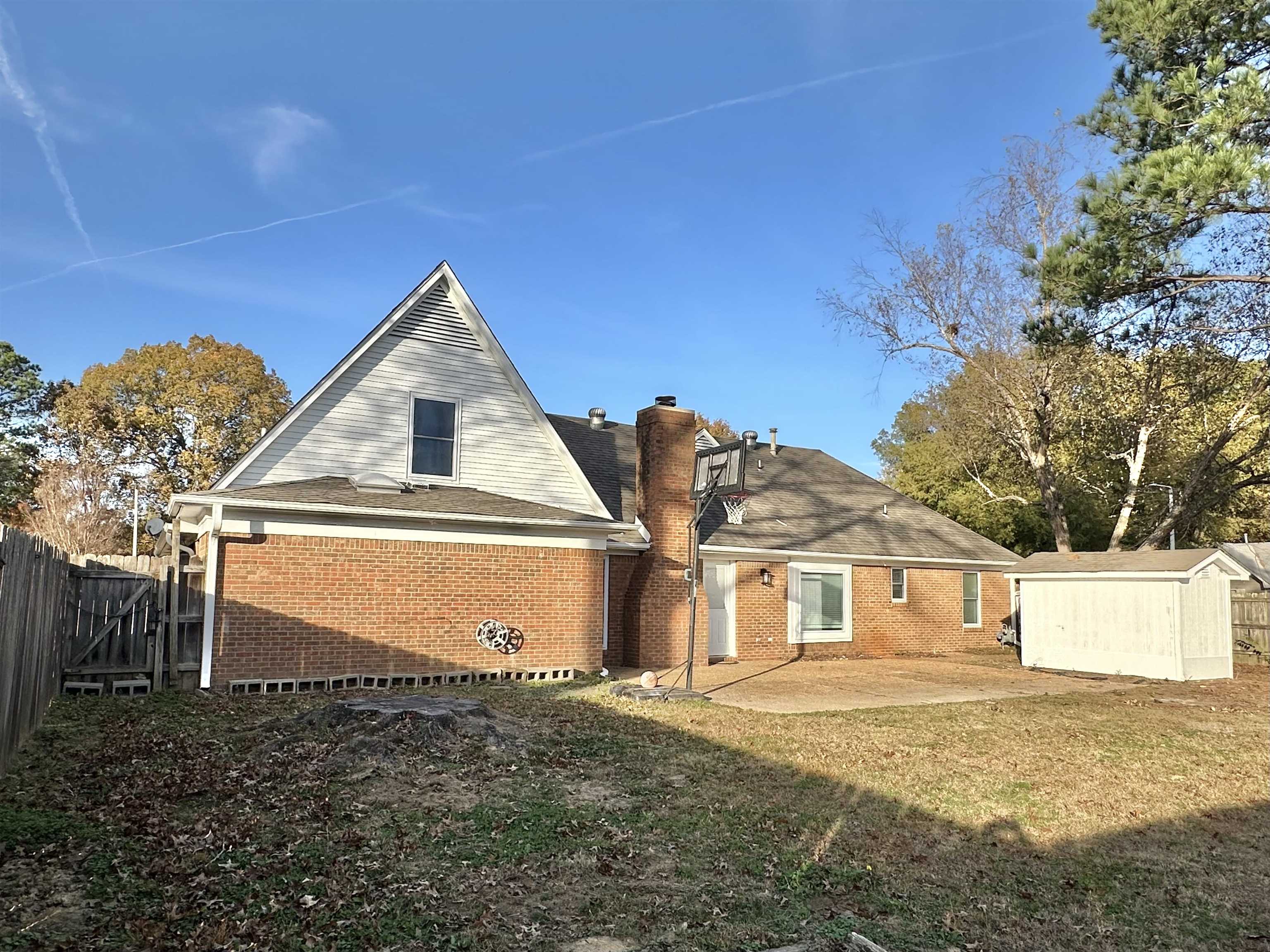 7475 Kingsland Drive Memphis, TN 38125 - Photo 29 of 32 a view of front of house with a yard