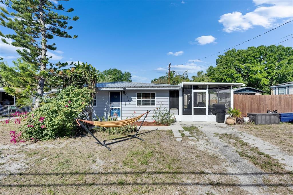 8805 Cobb Road Riverview, FL 33578 - Photo 1 of 1 a house view with a sitting space and garden