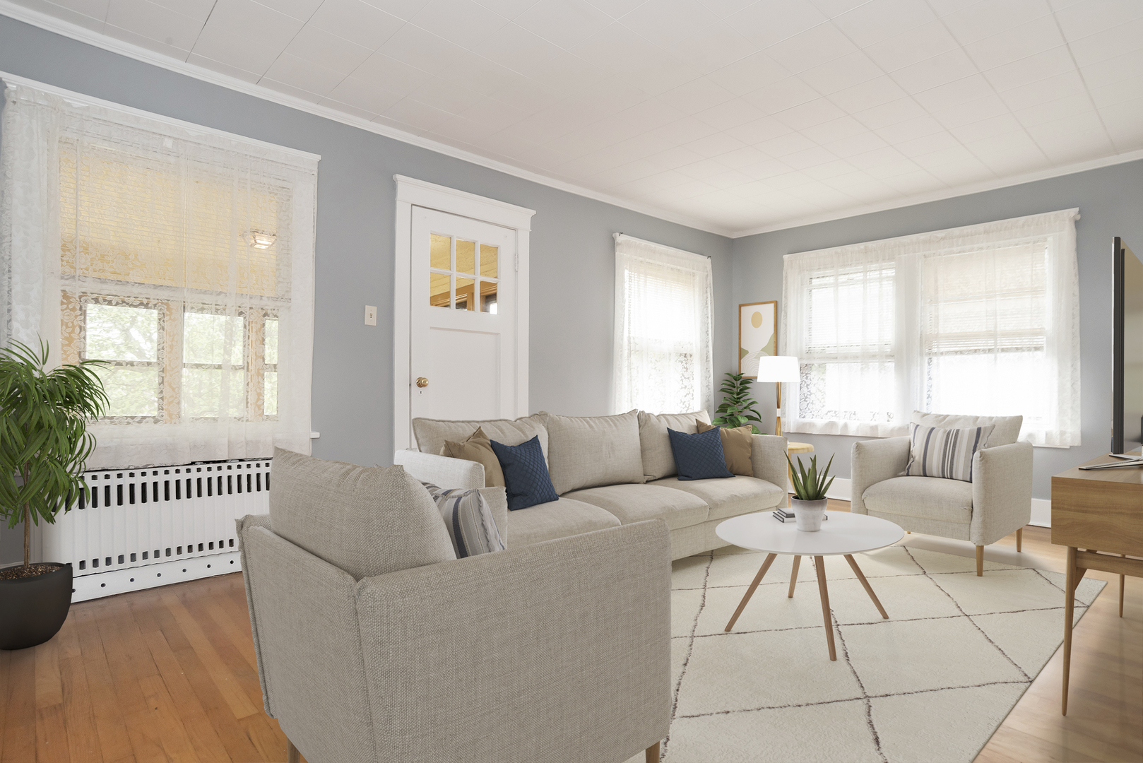 24 North Madison Avenue, Unit 2 La Grange, IL 60525 - Photo 2 of 14 a living room with furniture and a large window