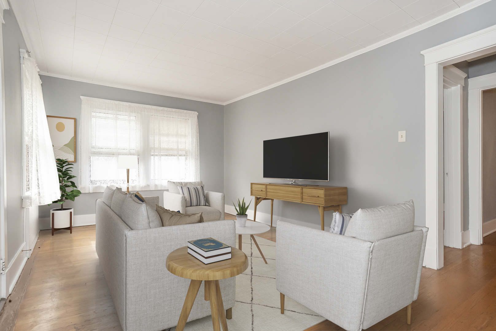24 North Madison Avenue, Unit 2 La Grange, IL 60525 - Photo 3 of 14 a living room with furniture and a flat screen tv