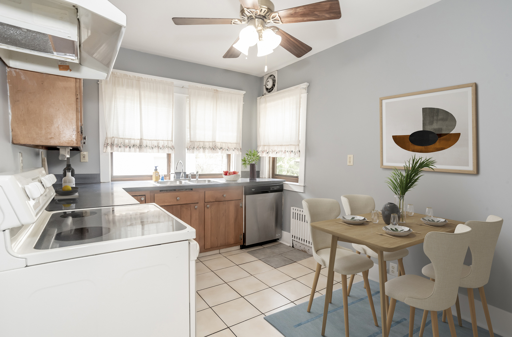 24 North Madison Avenue, Unit 2 La Grange, IL 60525 - Photo 5 of 14 a kitchen with a sink cabinets and window