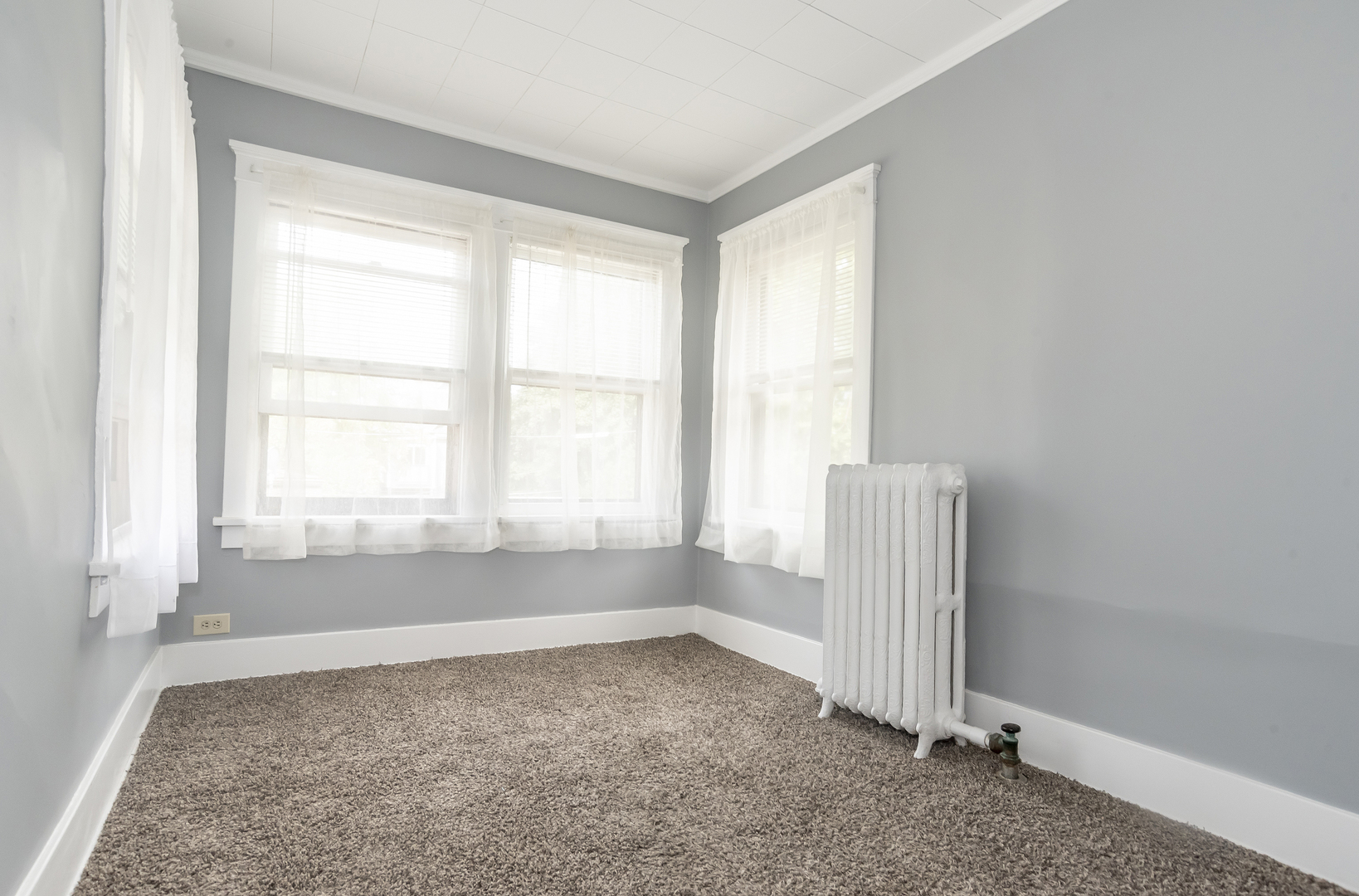 24 North Madison Avenue, Unit 2 La Grange, IL 60525 - Photo 10 of 14 an empty room with a empty space and windows