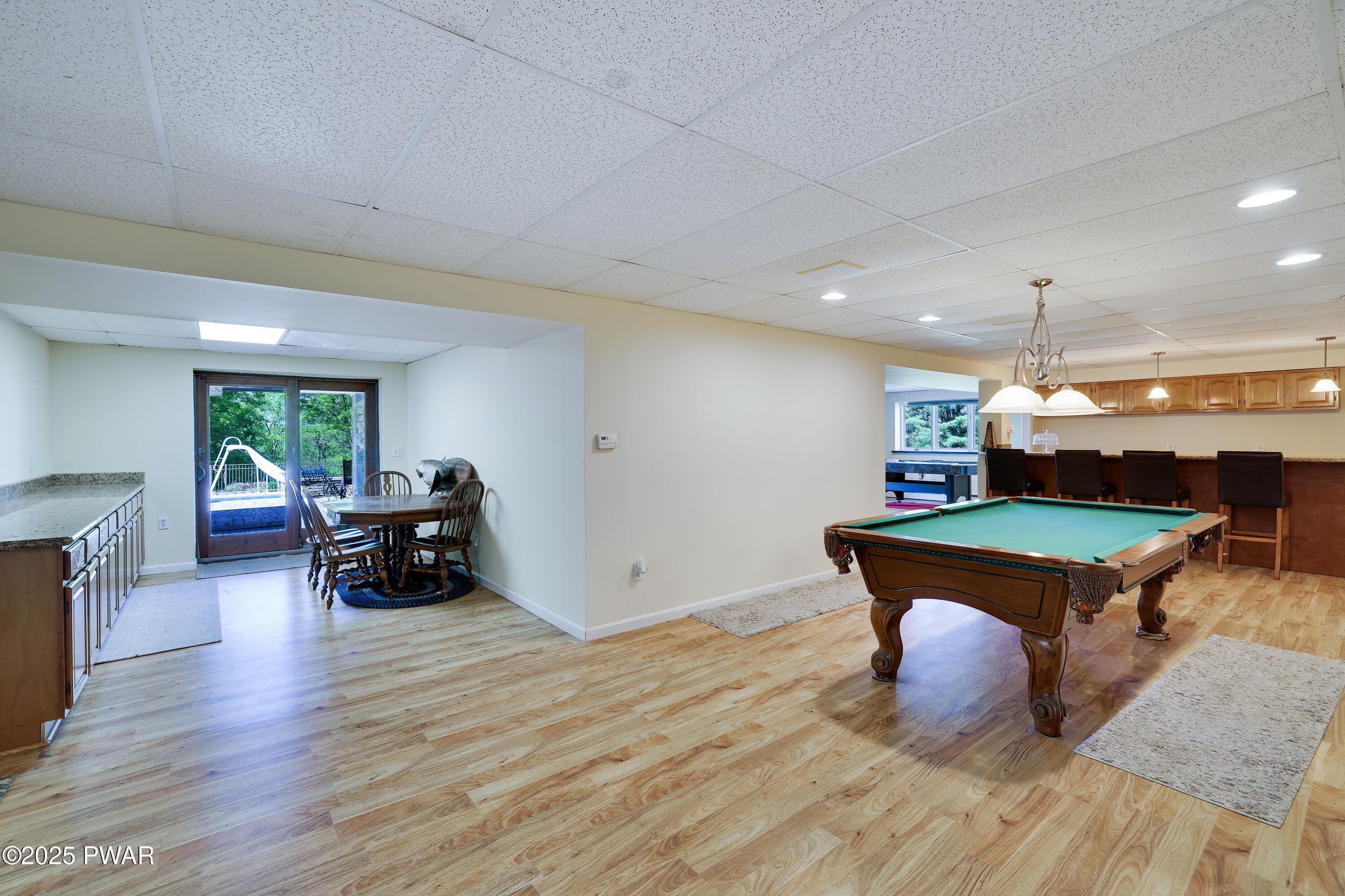 555 Valley View Road Dallas, PA 18612 - Photo 59 of 99 a room with furniture and a wooden floor