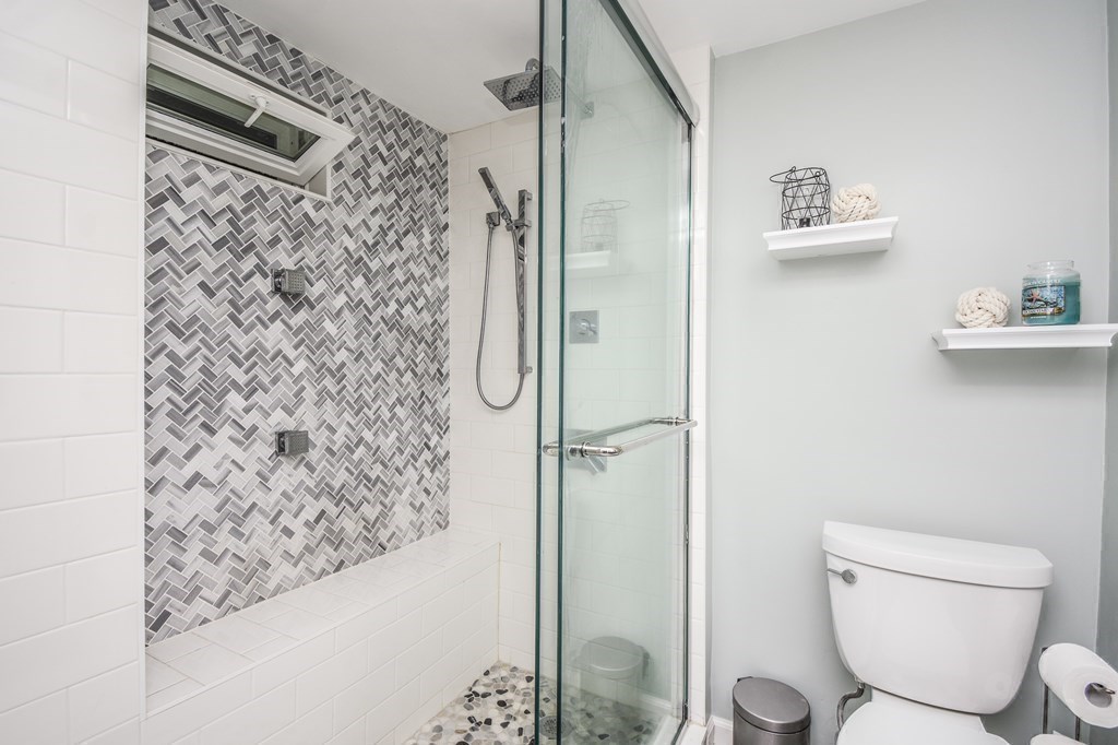 266 Bowen Street, Unit 1 Boston, MA 02127 - Photo 20 of 33 a bathroom with a toilet and shower