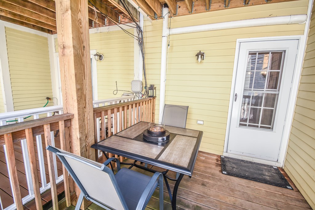 266 Bowen Street, Unit 1 Boston, MA 02127 - Photo 28 of 33 a view of a balcony dining area with furniture