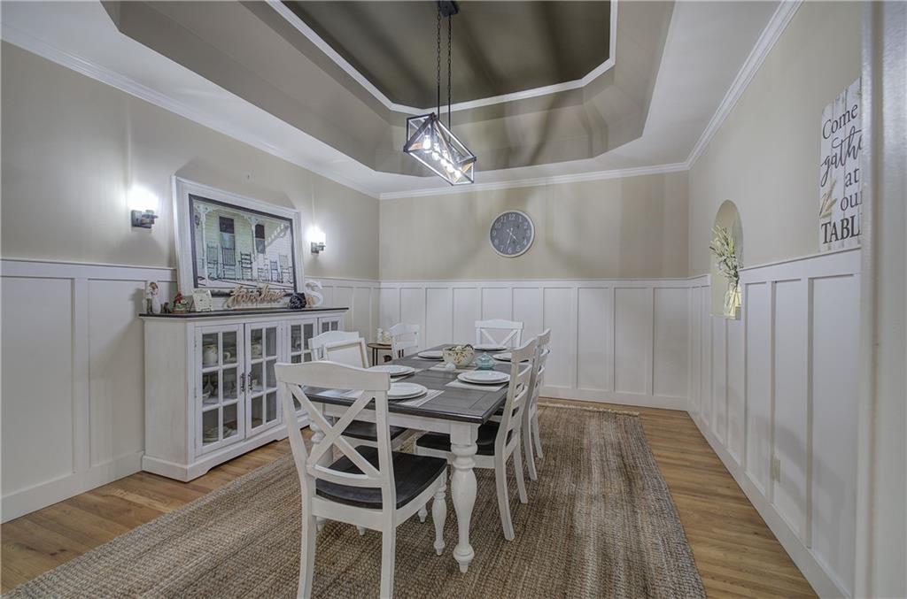 181 Fox Den Circle Jasper, GA 30143 - Photo 30 of 111 a view of a dining room with furniture and wooden floor