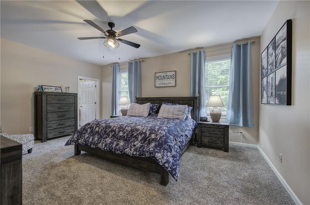 181 Fox Den Circle Jasper, GA 30143 - Photo 31 of 111 a bedroom with a bed dresser and a window