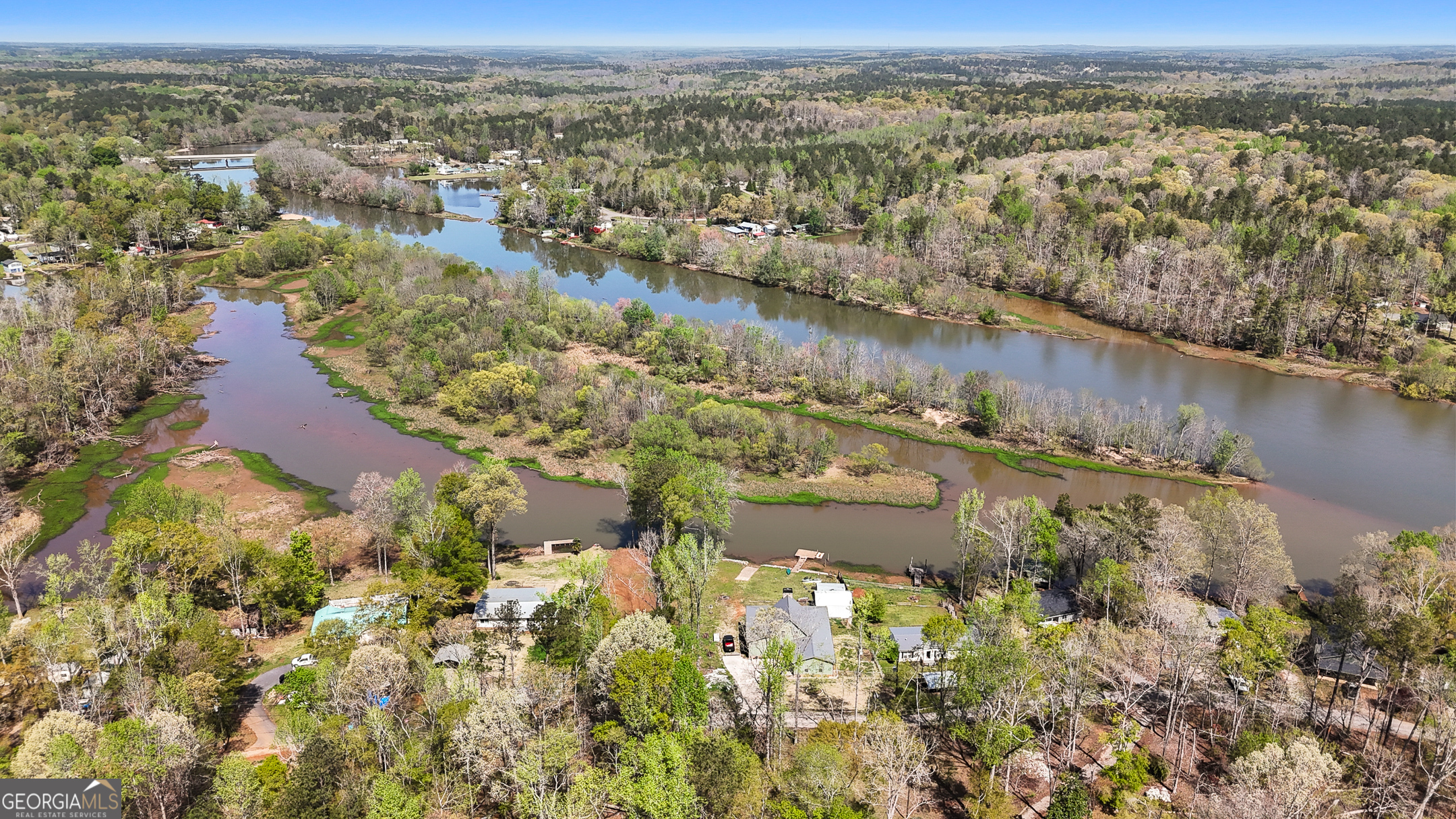 0 Henry Higgins Road Jackson, GA 30233 - Photo 10 of 12 an aerial view of residential houses with outdoor space and lake view