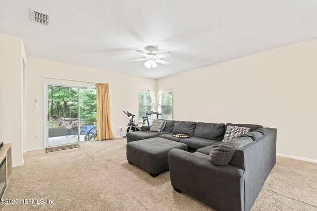 a white bath tub sitting next to a window
