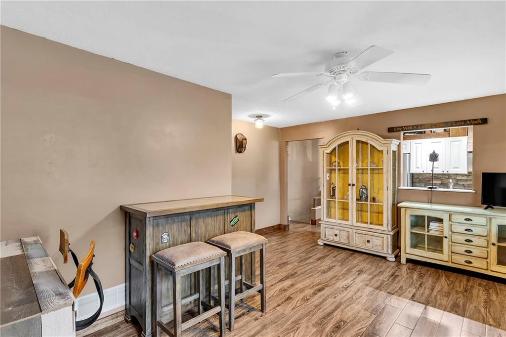 1233 Old Concord Road Monroeville, PA 15146 - Photo 12 of 40 a view of a livingroom with furniture window and wooden floor
