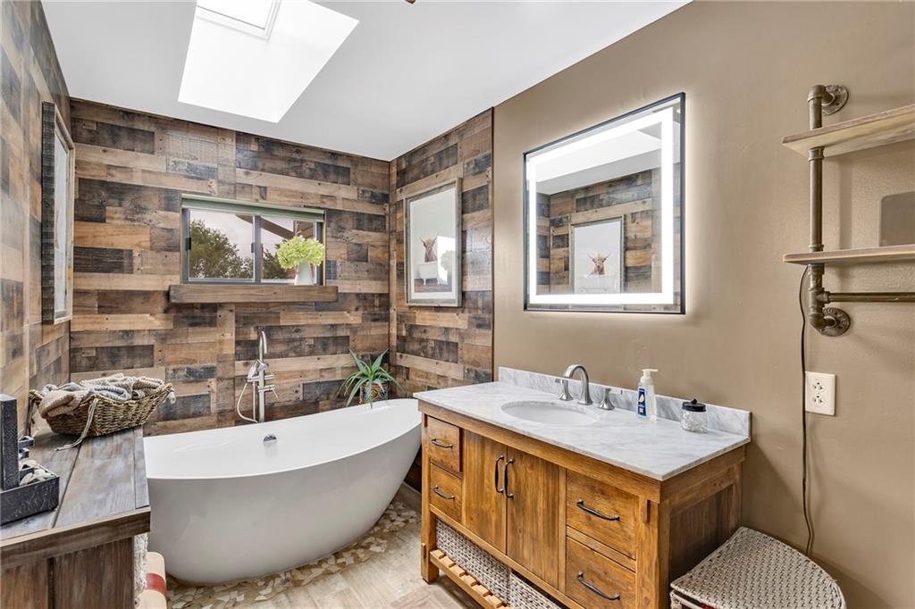 1233 Old Concord Road Monroeville, PA 15146 - Photo 19 of 40 a bathroom with a tub sink and mirror