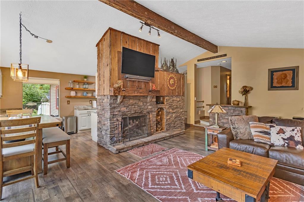 1233 Old Concord Road Monroeville, PA 15146 - Photo 23 of 40 a living room with patio furniture and a flat screen tv