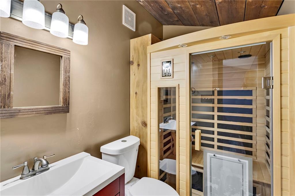 1233 Old Concord Road Monroeville, PA 15146 - Photo 31 of 40 a bathroom with a sink a toilet and shower