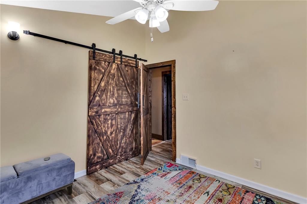 1233 Old Concord Road Monroeville, PA 15146 - Photo 34 of 40 a view of a chandelier fan and wooden floor