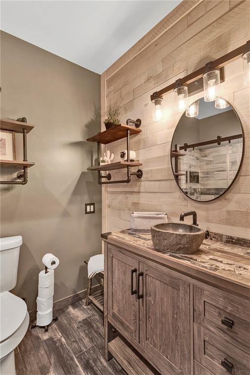 1233 Old Concord Road Monroeville, PA 15146 - Photo 35 of 40 a bathroom with a sink a toilet and a mirror