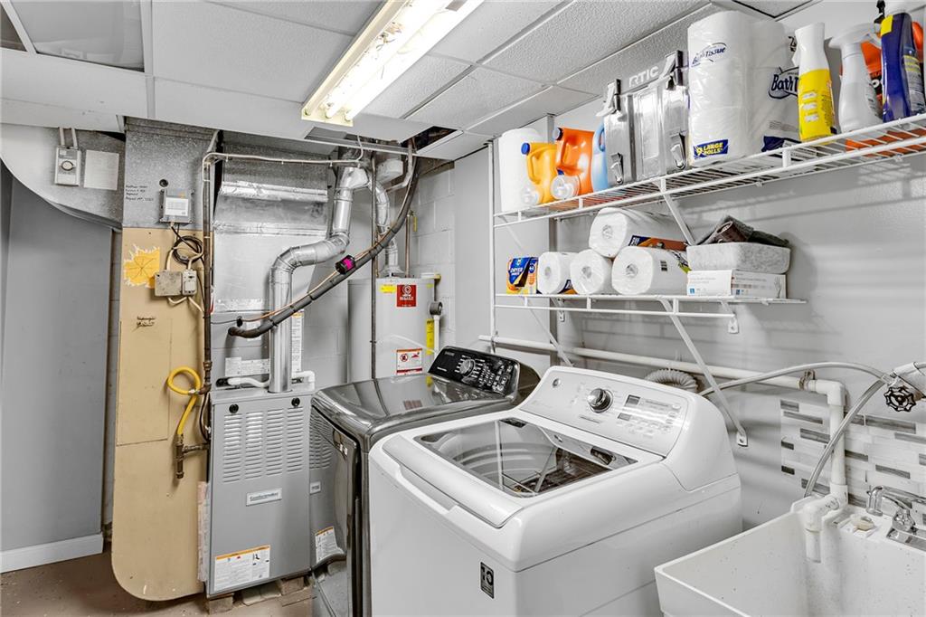 1233 Old Concord Road Monroeville, PA 15146 - Photo 37 of 40 a utility room with dryer and washer