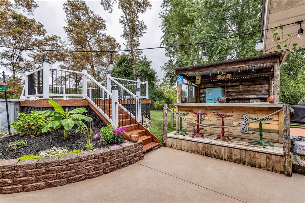 1233 Old Concord Road Monroeville, PA 15146 - Photo 4 of 40 a view of a roof deck with wooden fence and plants