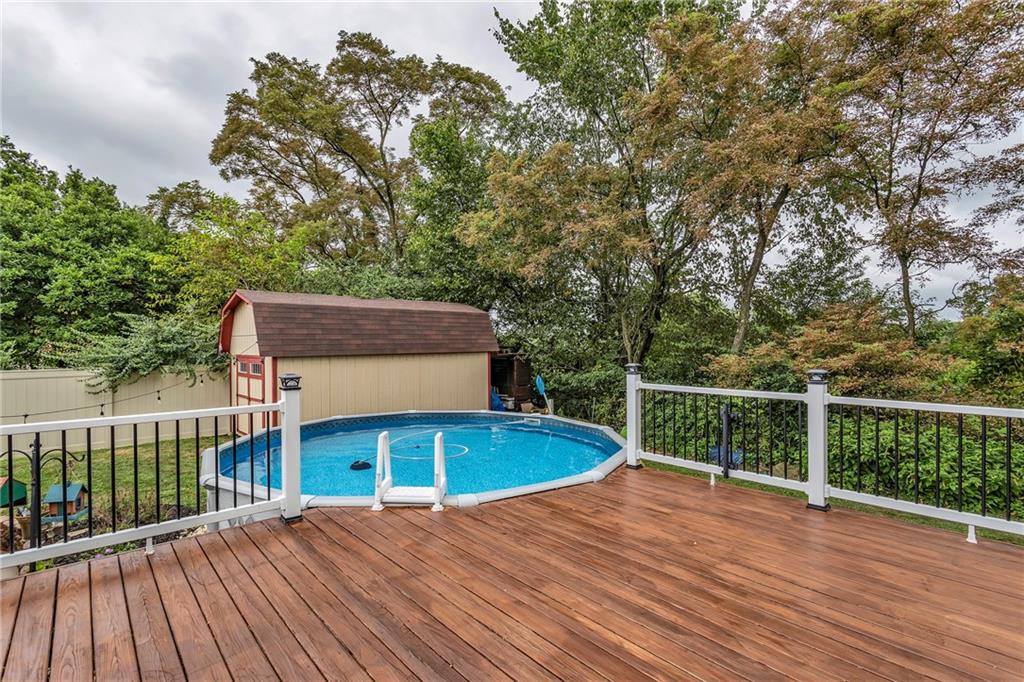 1233 Old Concord Road Monroeville, PA 15146 - Photo 6 of 40 a view of a wooden deck and a tall trees